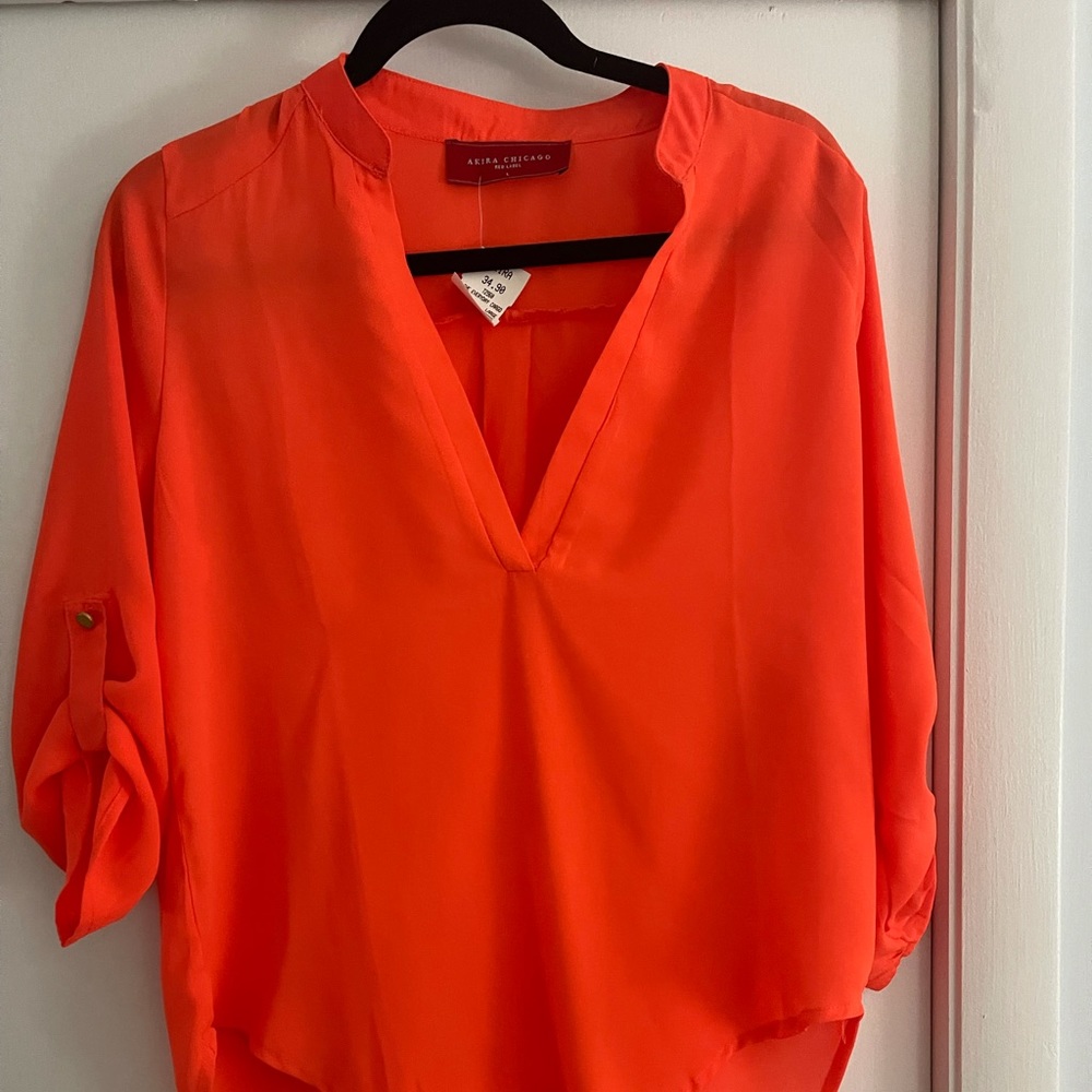 Bright orange blouse